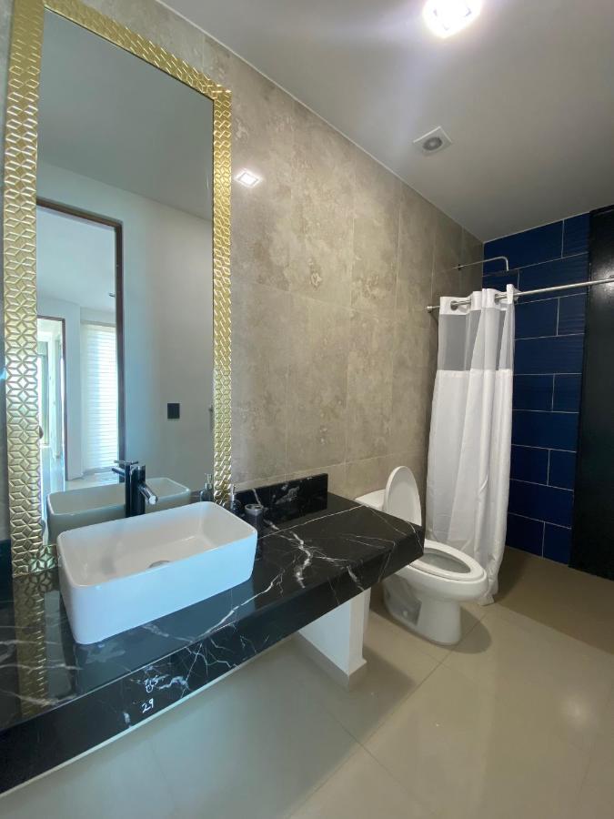 Angelina 28 Beachfront And Family Apartments - Modern And Relaxing Long Stays - 20 Min From Cancun Airport Puerto Morelos Eksteriør billede
