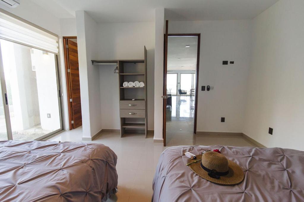 Angelina 28 Beachfront And Family Apartments - Modern And Relaxing Long Stays - 20 Min From Cancun Airport Puerto Morelos Eksteriør billede